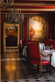 restaurant manager in elegant dining room